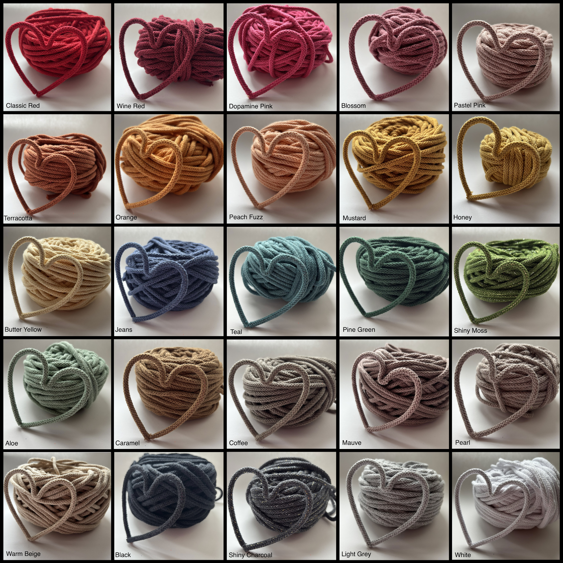 Grid of yarn balls shaped into hearts in various colors on a white background